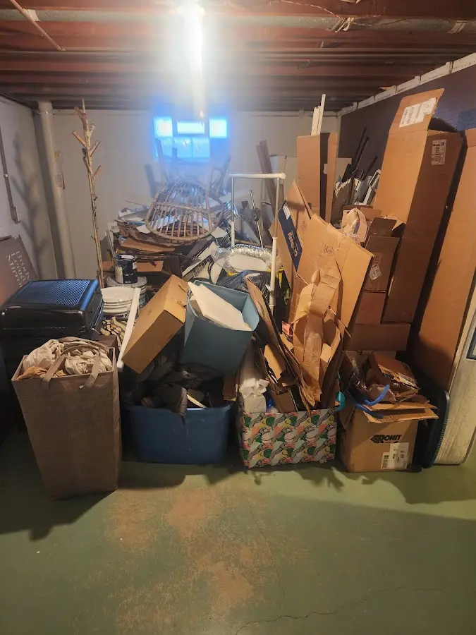 Roll-off dumpster container at job site for 2 Yard Dumpster Rental in Ridley Park